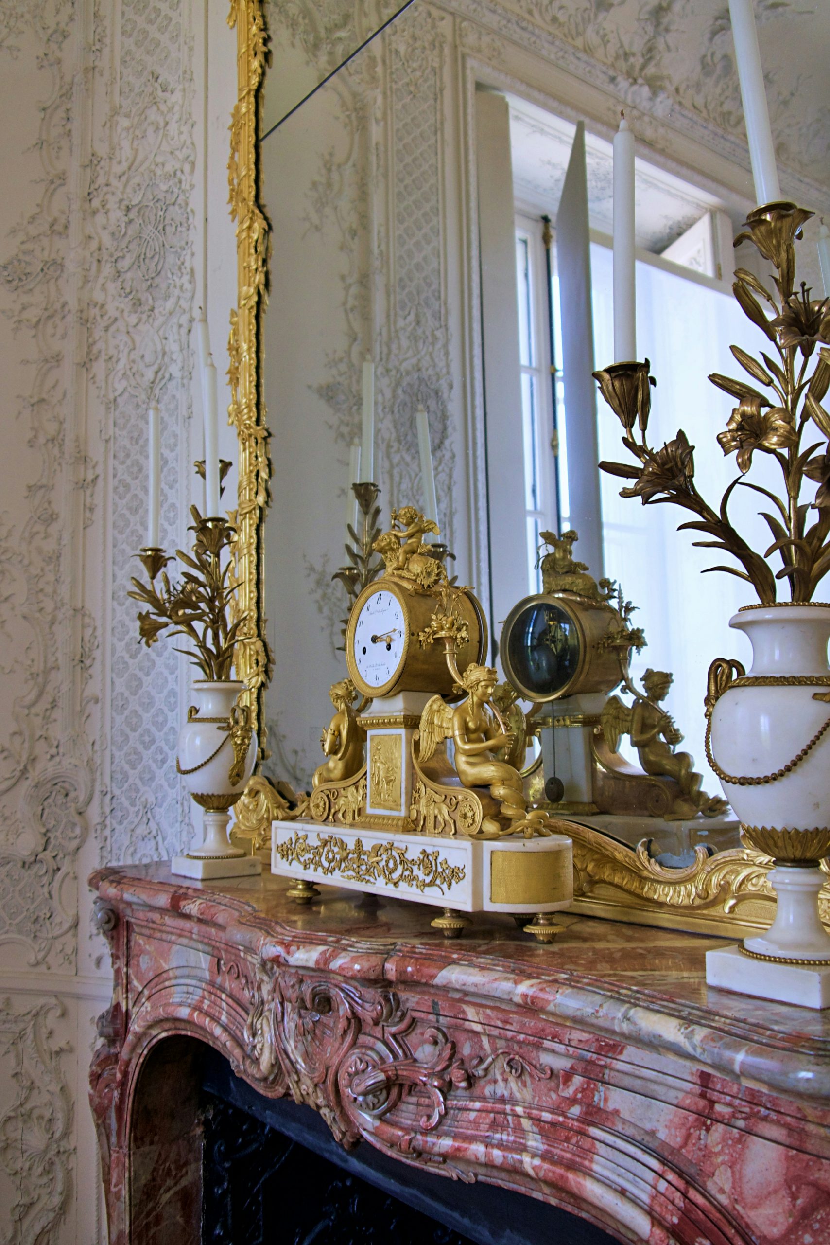 restauration dorure Vienne trumeau pendule bronze doré